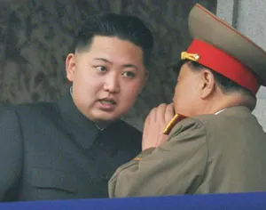 Kim Jong-un, youngest son of North Korean leader Kim Jong-il,  listens to an official speaking during a parade in Pyongyang