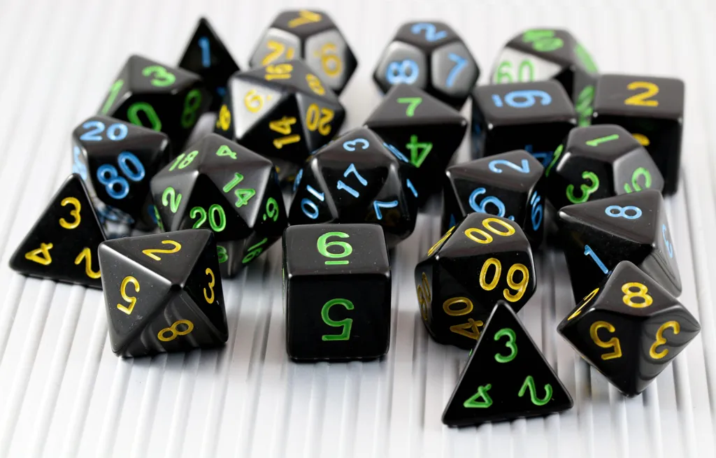 Black polyhedral game dice used for Dungeons and Dragons