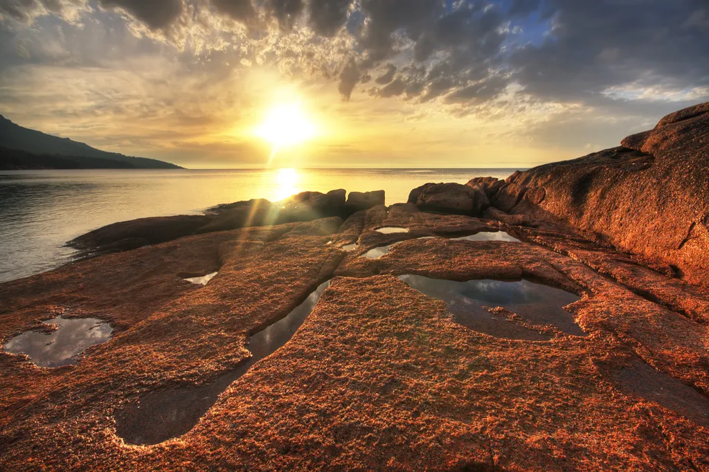 Sunset at Honeymoon Bay, Freycinet Peninsula, Tasmania, Australia.